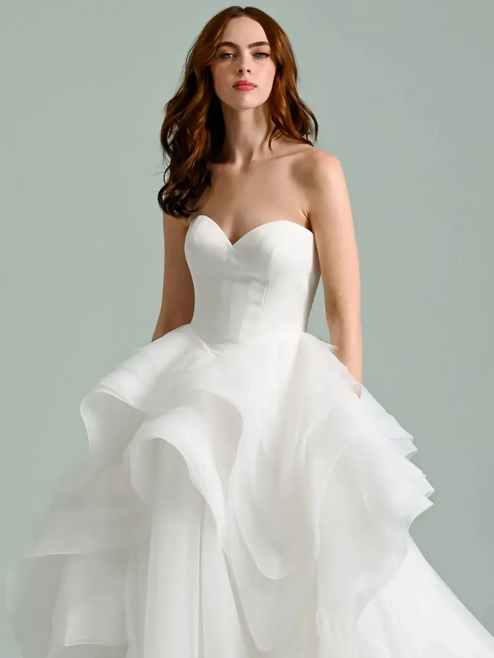 model is wearing a strapless bridal gown